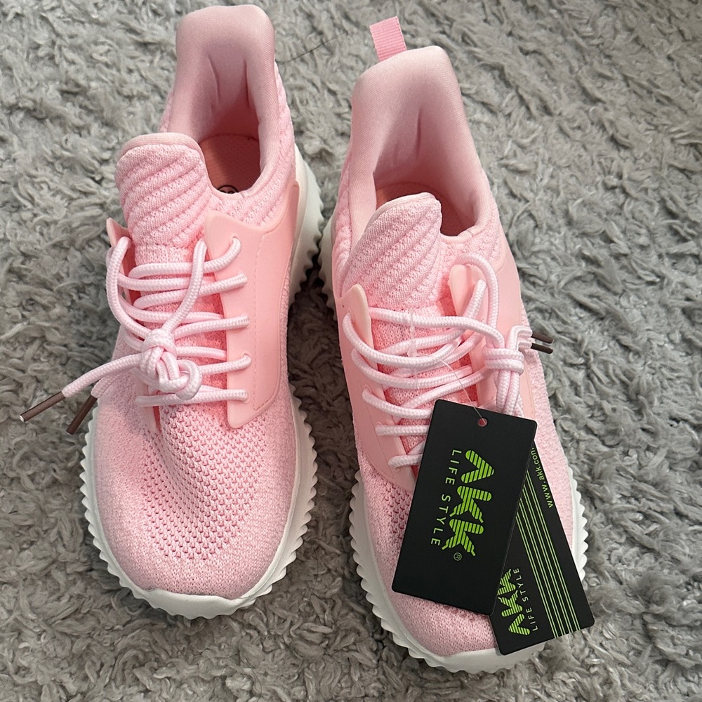 Pink slip on walking sneaker